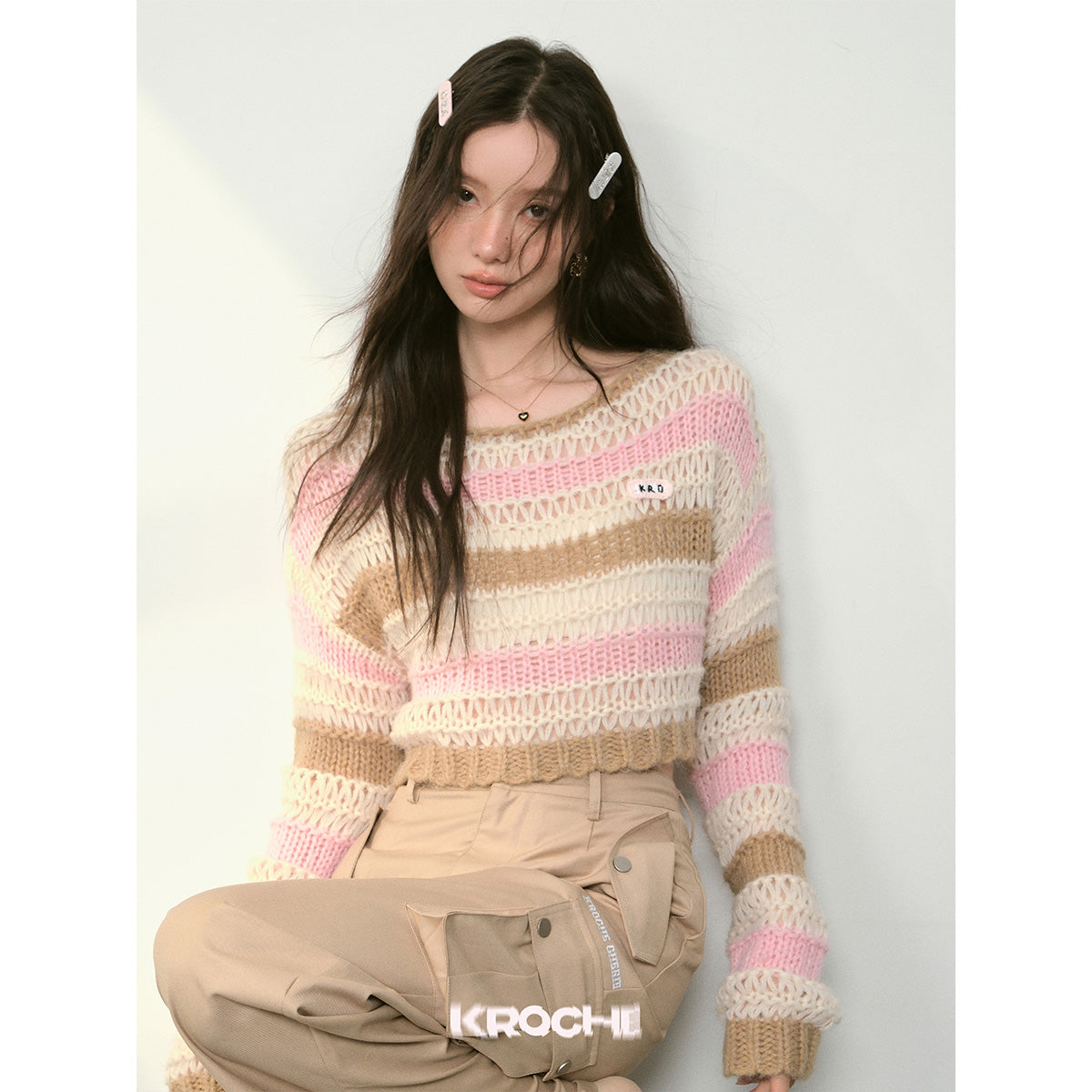 Kroche Color Blocked Striped Hollow Knitted Sweater