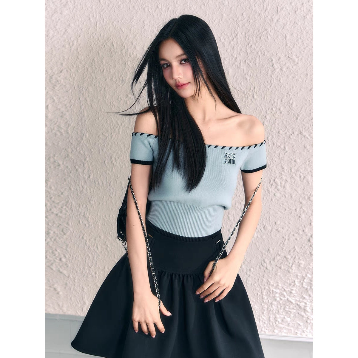 AGAM Off-Shoulder Metal Logo Knit Top